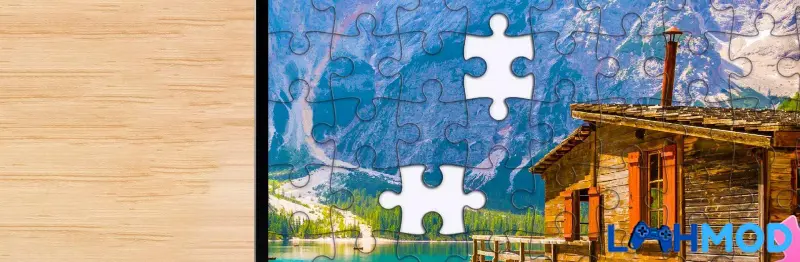 Ảnh 3 của Tải Jigsawscapes Apk 1.2.4 cho Android Người dùng đang cầm điện thoại chơi Jigsawscapes