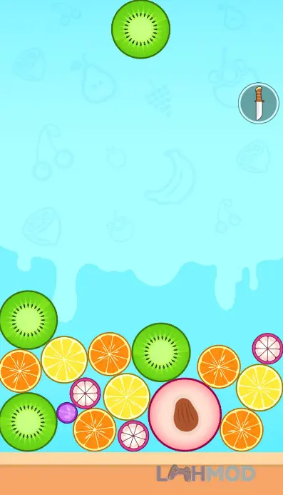 Ảnh 3 của Tải Merge Watermelon Apk 1.0.8 cho Android iOs Người chơi đang kéo các quả dưa hấu cùng loại để hợp nhất trong Merge Watermelon